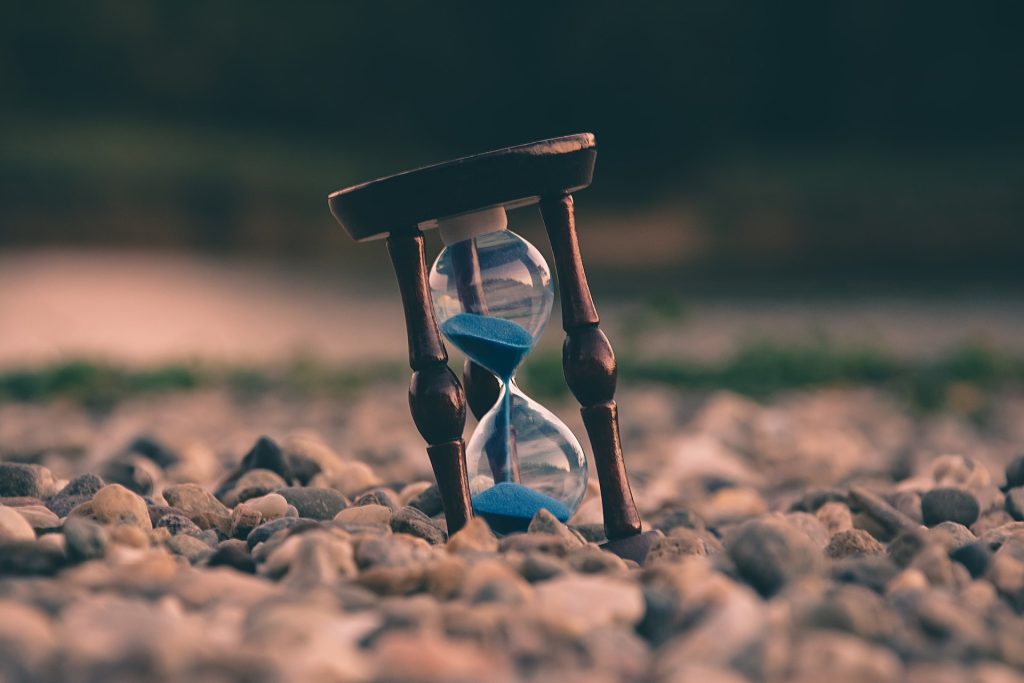 An hourglass starting to tip over